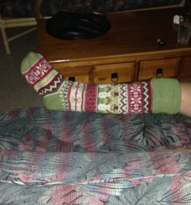 just trying it on for size, and i suspect to keep his little toes-ies warm